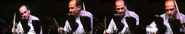 Joshua Fried playing the musical shoes. Copyright (c) 2000 Marilyn Rivchin- all rights reserved