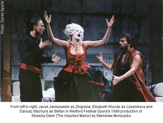 From left to right, Jacek Janiszewski as Zbigniew, Elizabeth Woods as Czesnikova and Dariusz Stachura as Stefan in Wexford Festival Opera's 1999 production of Straszny Dwór (The Haunted Manor). Photo: Derek Speirs