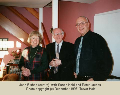 John Bishop (centre), with Susan Hold and Peter Jacobs in December 1997. Photo (c) 1997 Trevor Hold
