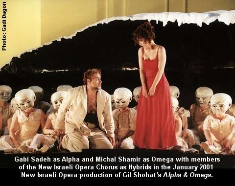 Gabi Sadeh as Alpha and Michal Shamir as Omega with members of the New Israeli Opera Chorus as Hybrids in the January 2001 New Israeli Opera production of Gil Shohat's 'Alpha and Omega'. © New Israeli Opera. Photo: Gabi Dagon