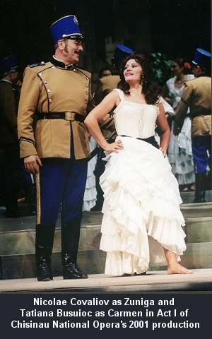 Nicolae Covaliov as Zuniga and Tatiana Busuioc as Carmen in Act I of Chisinau National Opera's 2001 production of Bizet's 'Carmen'
