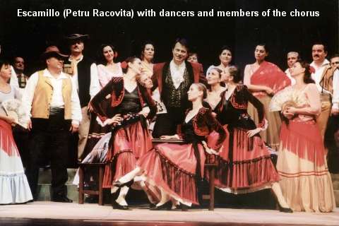 Escamillo (Petru Racovita) with dancers and members of the chorus
