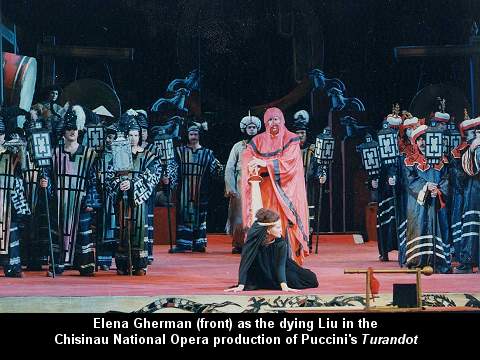 Elena Gherman (front) as the dying Liu in the 2001 Chisinau National Opera production of Puccini's 'Turandot'