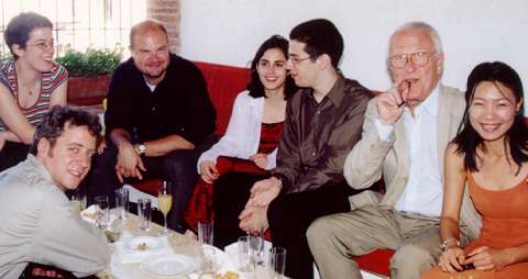An admirer, Jeremy Denk, Randall Scarlata, Katherine Needleman, Jonathan Biss, Scott Nickrenz and Hsiw-Yun Huang (left to right) at a Spoleto 2001 reception. Photo: Bill Newman