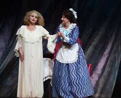 Violetta (Elena Gherman) with her maid