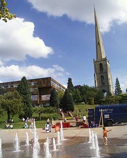 A Festival fringe show near Worcester's new fountain. In the background, the 'Glover's Needle'. Photo: Keith Bramich