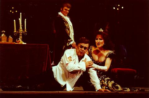 Mihai Munteanu as Cavaradossi (foreground) with Boris Materinco (rear) and Ludmila Magomedova in the title role in the 2001 Chisinau National Opera production of Puccini's 'Tosca'