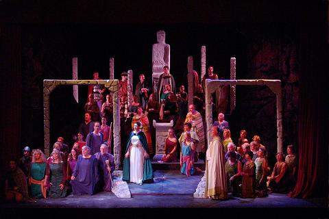 Norma (Karine Babajanyan, centre) and Oroveso (Michail Milanov, right) with the fine Dorset Opera Chorus in 'Norma'. Photo : Ikon Studios, Sherborne