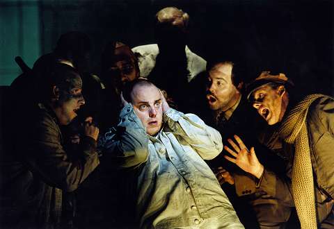Matthias Goerne as Wozzeck amid his taunters. Photo : Bill Cooper/Performing Arts Library
