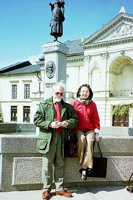 John McCabe and Tamami Honma in Klaipeda Market Square. During the German occupation, Klaipeda was known as Memeris (a seaside resort for the Germans) where Hitler gave various speeches from the second floor balcony which you can see to the right of Tamami Honma's head. Photo © 2003 Loreta Narvilaite
