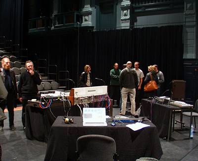 After the concert, members of the audience examine the onstage setup and discuss the performance. Photo: Keith Bramich 2003