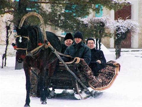 Mark Malkovich and Kazuki Sawa travel in traditional Kazakh style. Photo © 2004 Howard Smith