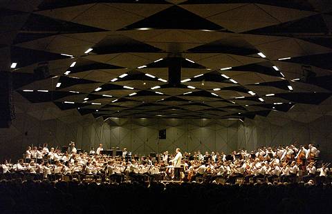 The Boston Symphony Orchestra and the Tanglewood Music Center Orchestra perform together in the Koussevitzky Music Shed during the annual 'Tanglewood on Parade' celebration. Photo © 2004 Stu Rosner
