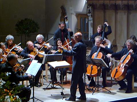 Dennis Russell Davies conducts the Stuttgart Chamber Orchestra in Oberstdorf. Photo: Philip Crebbin