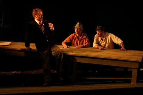 Jonathan Finney as Loge with Fasolt and Fafner. Photo © Stephen Wright