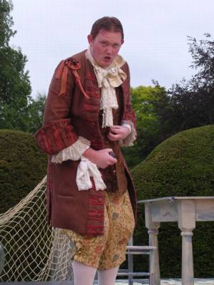 Nicholas Merryweather as the rich fop Villotto in Bampton Classical Opera's witty garden production of Haydn's 'La vera costanza'