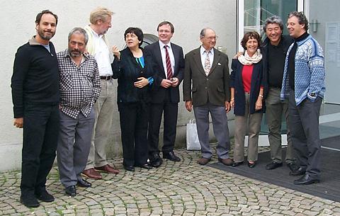 The PCCC jury. From left to right: Gary Hoffman, Michael Flaksman, Frans Helmerson, Natalia Gutman, Raimund Trenkler, Bernard Greenhouse, Graciane Finzi, Young-Chang Cho and Julius Berger. Photo © 2004 Annette Wittkopf