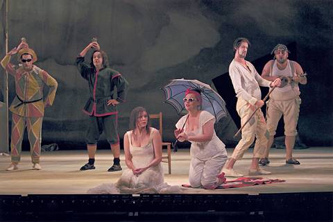 A scene from the Welsh National Opera 2004 production of Richard Strauss's 'Ariadne', showing (front stage, from the left) Janice Watson (Ariadne) and Katarzyna Dondalska (Zerbinetta). Photo © 2004 Clive Barda