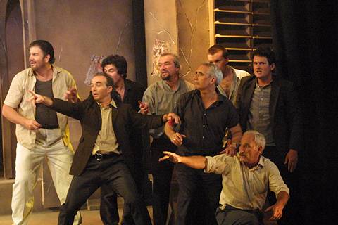 Part of Stowe Opera's lively and engaged men's chorus in the 2004 production of 'Carmen'. Photo © 2004 John Credland