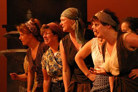 Members of the mutually jibing women's chorus outside the Seville cigarette factory. Photo © 2004 John Credland