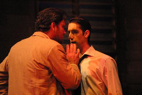 Dancairo (Robert Williams, left) instructs Remendado (Alex Grove, right). Photo © 2004 John Credland