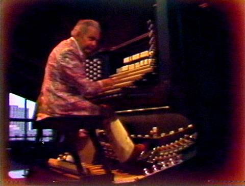A still frame from the DVD showing Virgil Fox at the consolei of St Mary's Cathedral. © 2004 Circles International