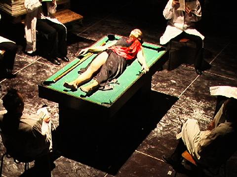 A tatty pool table in a low Buenos Aires bar serves as Maria's diagnosis couch as she is interrogated by the psychoanalysts who sit around reading their volumes of Freud. Photo © Casper Sejersen