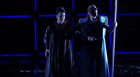 Wotan's merciless drubbing from Fricka (Lioba Braun) in Act 2. DVD screenshot © 2005 Opus Arte
