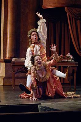 Ben Nordstrom as Mozart rides his wife, Costanze Weber (Kathryn Cherasaro) in 'Amadeus'. Photo © 2005 Roger Mastroianni