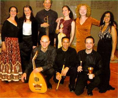 Members of Boston Camerata (standing) and of the Sharq Ensemble (kneeling). Photo courtesy of Joel Cohen