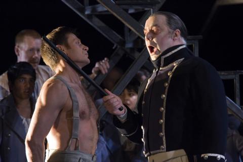 Simon Keenlyside as Bily Budd (left) with John Tomlinson as Claggart. Photo © 2005 ENO/Clive Barda