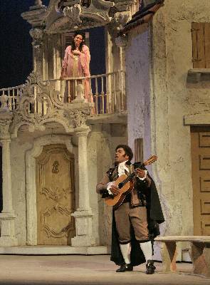 Count Almaviva (Lawrence Brownlee) woos Rosina (Kirstin Chávez) in the San Diego Opera production of 'The Barber of Seville'. Photo © 2006 Ken Howard