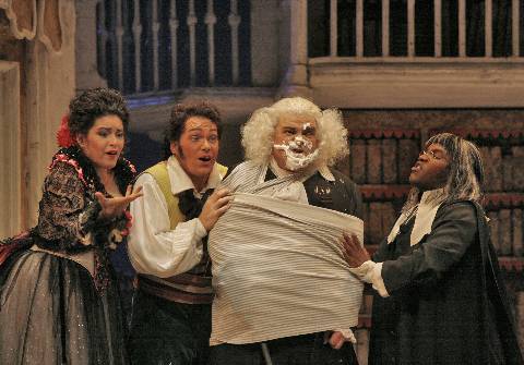 Left to right, Kirstin Chávez (Rosina), Christopher Maltman (Figaro), Eduardo Chama (Dr Bartolo) and Lawrence Brownlee (Count Almaviva) in the San Diego Opera production of 'The Barber of Seville'. Photo © 2006 Ken Howard