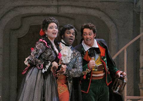 Left to right, Kirstin Chávez (Rosina), Lawrence Brownlee (Almaviva) and Christopher Maltman (Figaro) in the San Diego Opera production of 'The Barber of Seville'. Photo © 2006 Ken Howard