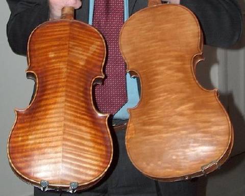 Comparing the backs of two instruments - the genuine Montagnana on the left. Photo © 2006 Philip Crebbin