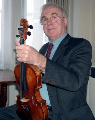 Charles Beare with a genuine Montagnana violin. Photo © 2006 Philip Crebbin