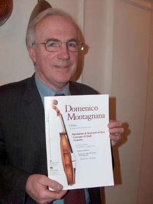 Charles Beare with the programme booklet from the September/October 1997 Exhibition of Domenico Montagnana string instruments in Lendinara, Italy, at which he was one of the principal speakers. Photo © 2006 Philip Crebbin