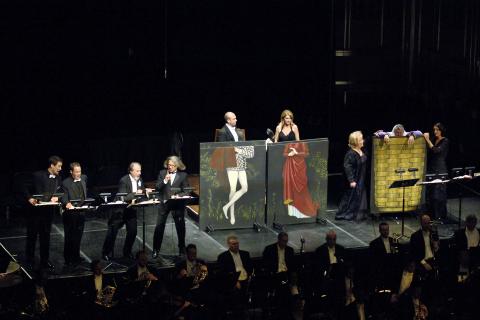 From left to right: Ain Anger (Pistola), Scott Scully (Bardolfo), Max René Cosotti (Dr Caius), Vladimir Chernov (Ford), Cataldo Caputo (Fenton), Cinzia Forte (Nannetta), Jane Henschel (Mistress Quickly), Richard Sutliff (Falstaff, hiding in basket) and Kelley O'Connor (Meg Page), at the 8 June 2006 performance of Verdi's 'Falstaff' at Severance Hall, conducted by Franz Welser-Möst. Photo © 2006 Roger Mastroianni