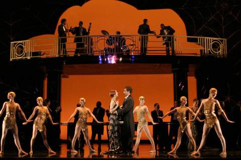 Suzanna Guzmán as Flora Bervoix and Lee Poulis as Marquis d'Obigny in the Act II 'party scene' of Verdi's 'La Traviata'. Photo © 2006 Robert Millard