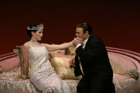 Elizabeth Futral as Violetta Valery and Joseph Calleja as Alfredo Germont in Act I of Verdi's 'La Traviata' in the Los Angeles Opera production. Photo © 2006 Robert Millard