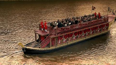A still from the performance 'extra', view 3 selected, showing the musicians on the reconstructed barge on the Thames. © 2003 BBC Worldwide Ltd/Opus Arte