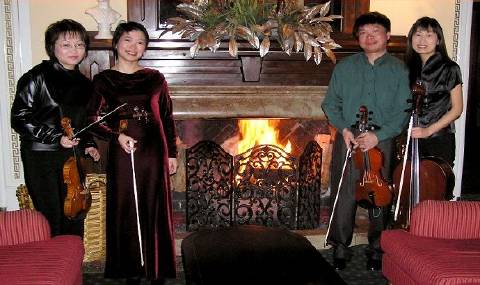 The Aroha String Quartet. From left to right: Beiyi Xue, Haihong Liu, Zhongxian Jin and Jiaxin Cheng. 'Aroha' is the Maori word for 'love'