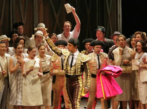 Laurent Naouri (Escamillo) and ensemble in the Santa Fe Opera production of Bizet's 'Carmen'. Photo © 2006 Ken Howard