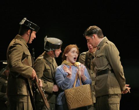 Jennifer Black (Micaëla) and ensemble in the Santa Fe Opera production of Bizet's 'Carmen'. Photo © 2006 Ken Howard