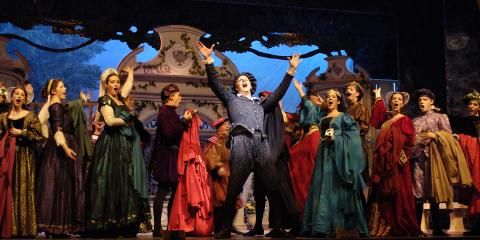 Jack Beetle as Cervantes (centre, arms in the air) in Ohio Light Opera's production of 'The Queen's Lace Handkerchief'. Photo © 2006 Matt Dilyard