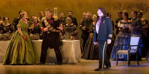 The banquet scene. Lori Phillips as Lady Macbeth, Louis Otey as Macbeth and Peter Volpe as Banquo's ghost. Photo © 2006 Tim Fuller