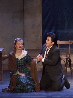 Mimi (Elena Razgylyaeva) and Rodolfo (Gabriel Gonzalez) in Act I of 'La bohème'. Photo © 2006 Robin Grant