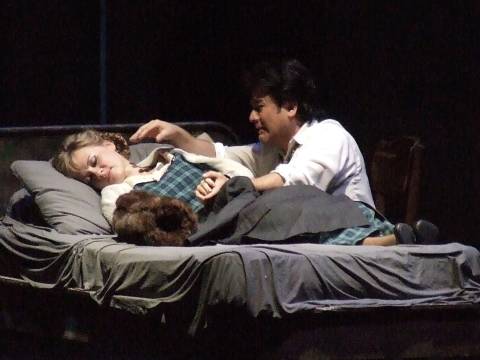 Mimi (Elena Razgylyaeva) and Rodolfo (Gabriel Gonzalez) at the end of 'La bohème'. Photo © 2006 Robin Grant