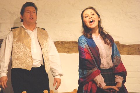 David Palmer as Marcello and Michaela Bloom as Musetta in Act 3 of the Heritage Opera staging of 'La Bohème'. Photo © 2007 Sebastian Fattorini, Skipton Castle