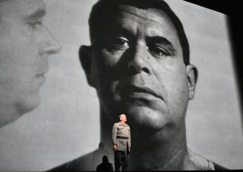 Franz Hawlata in the title role of 'Wozzeck' in front of a video designed by Dustin O'Neil. Photo © 2007 Ken Howard